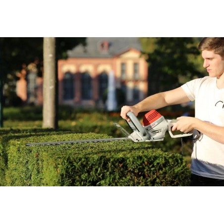 Taille-haie électrique 600W Double lame 55 cm Poignée ergonomique pivotante Frein électrique IKRA