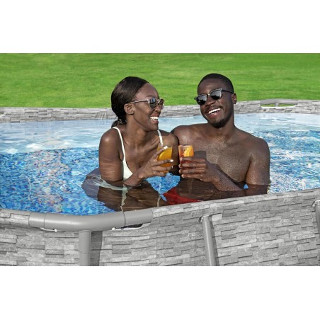 Piscine hors sol à Hublot 4.27x25 x10m Gris Effet Pierre- Piscine tubulaire ovale + Echelle, Pompe + Bâche 4 saisons Bestway